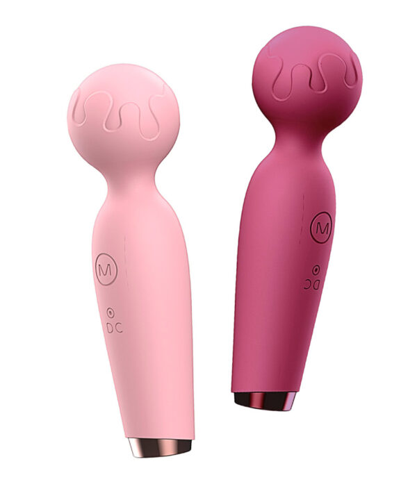 Varinha mágica recarregável Dona Coelha em rosa e pink, ideal para diversão e bem-estar. Design ergo.