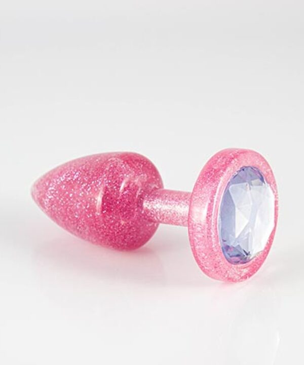 Brinquedo glamour rosa com glitter e pedra de strass brilhante, ideal para diversão e coleção.