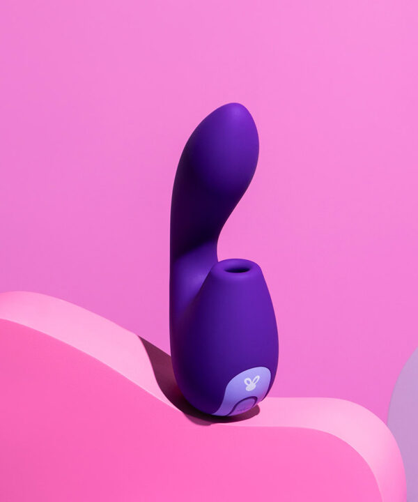 Vibrador rosa e roxo com design ergonômico, ideal para prazer feminino, com textura suave e funcionalidades avançadas para experiências sensoriais únicas.