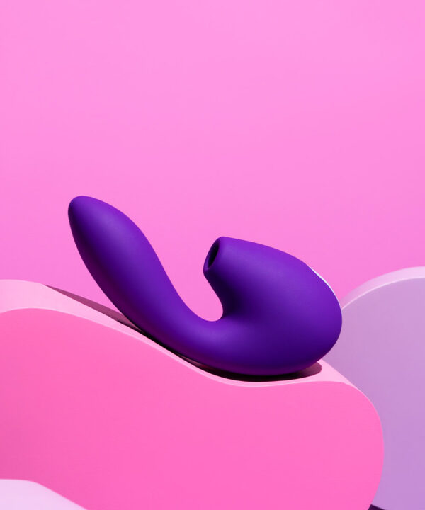 Fone vaginal roxo, estimulador clitóris, brinquedo erótico feminino, prazer íntimo, produto sensorial para mulheres, Dona Coelha, design moderno e discreto, saúde sexual feminina.