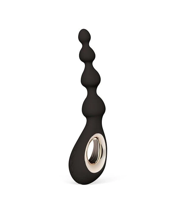Brinquedo erótico em silicone com design ergonômico e anel de metal para estimulação.