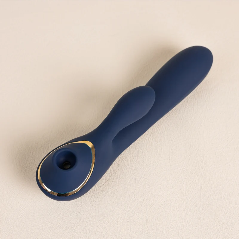 Brinquedo sexual em silicone azul com detalhes dourados para prazer e bem-estar.