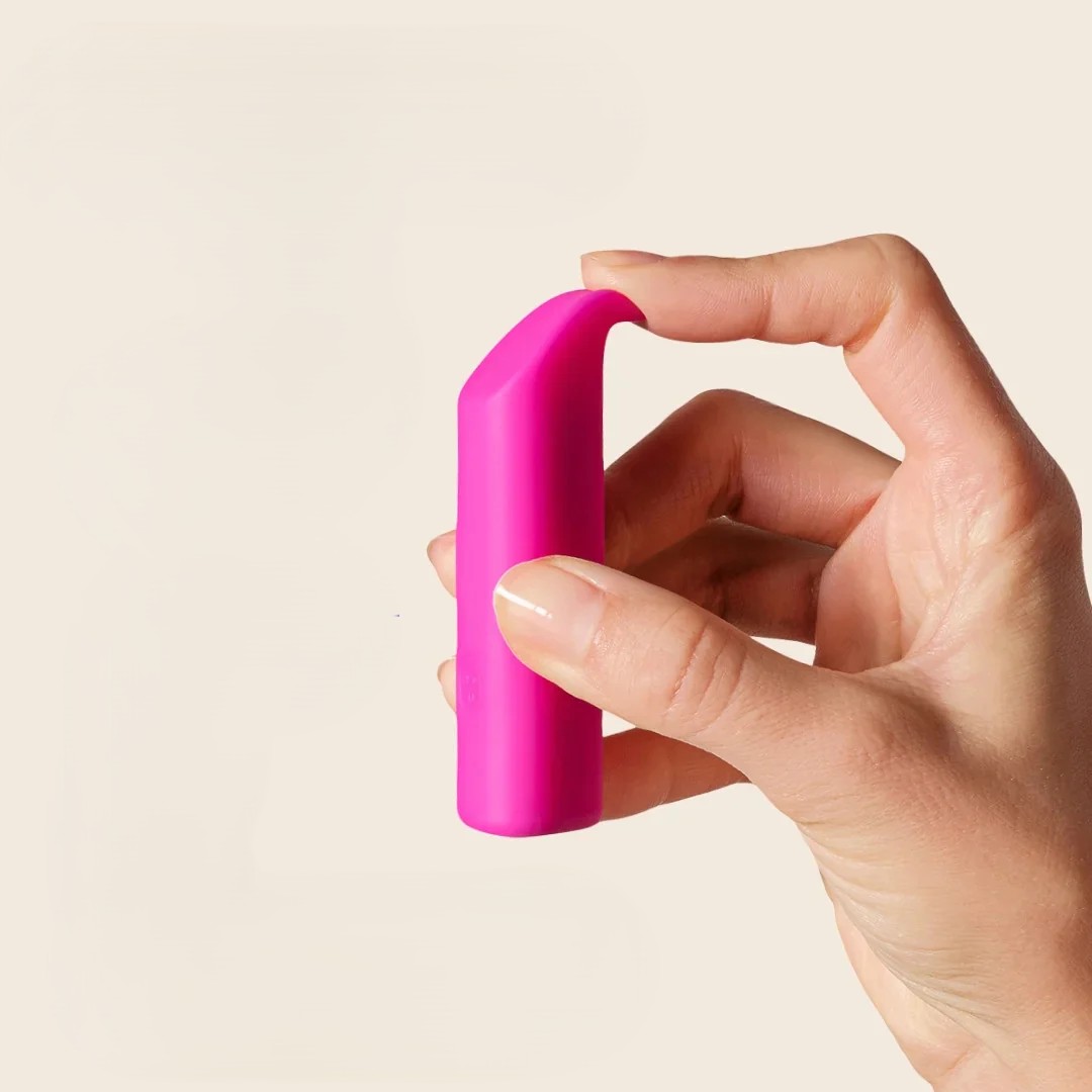 Brinquedo de borracha rosa para cães, durável e divertido, ideal para estimular o jogo e a mordida d.