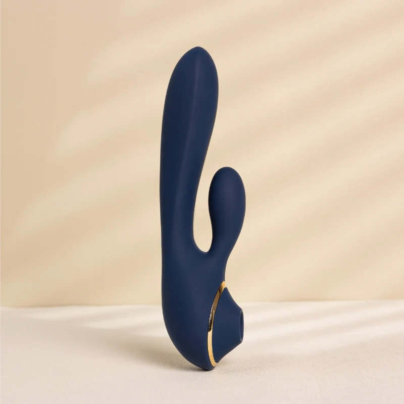 Vibrador de luxo azul escuro com detalhes dourados, ideal para prazer e bem-estar íntimo. Design ele.