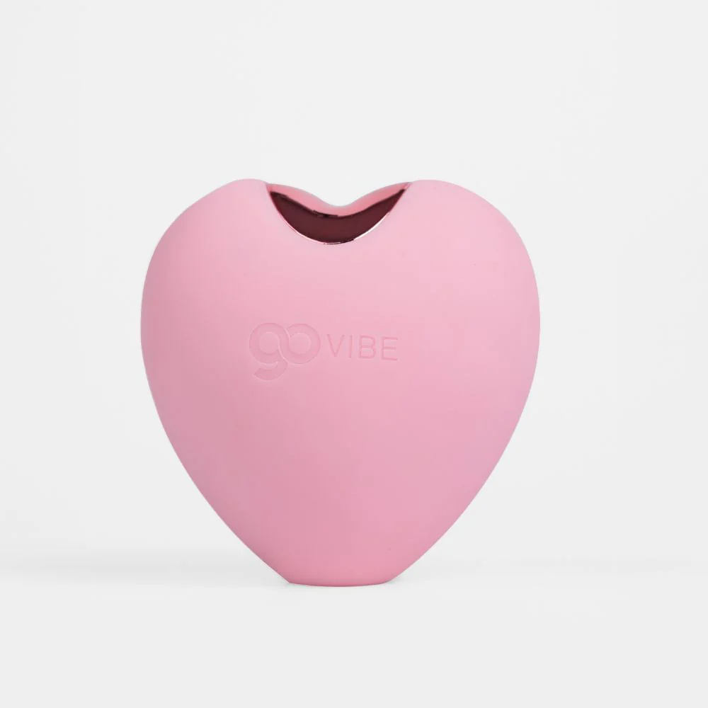 Vaso decorativo em formato de coração rosa, ideal para decoração de ambientes com estilo delicado e.