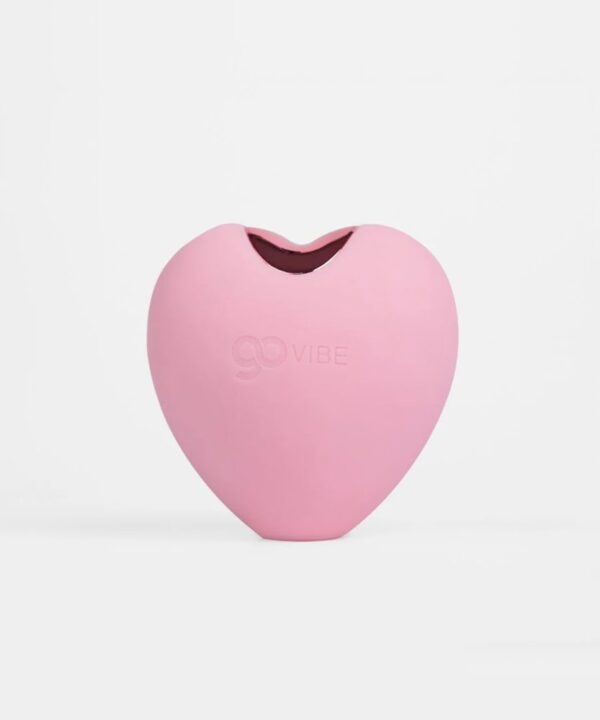 Vibrador em formato de coração rosa para estímulo íntimo.