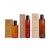 Óleos para massagem da linha Tantric com embalagens elegantes.